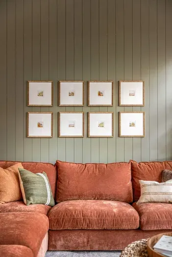 Refined living space with curated art and plush seating.
