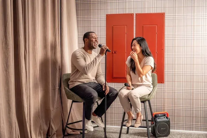 Gather for impromptu karaoke nights in this cozy lounge, complete with plush seating and your own stage-ready spotlight.
