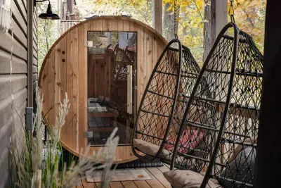 Step into your own spa retreat. Enjoy a rejuvenating cedar sauna session, then cool off in the hanging chairs with a peaceful forest backdrop.