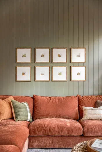 Refined living space with curated art and plush seating.