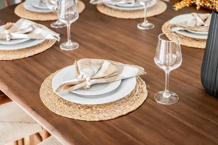 Dinner is served—simple, cozy table settings ready for long conversations and good food.