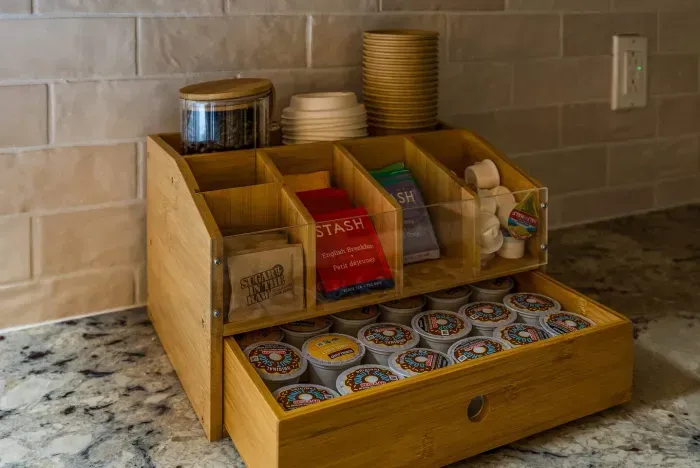 Enjoy complimentary coffee beans, assorted teas, Keurig pods, creamers, sugar, and to-go cups for your morning adventures.