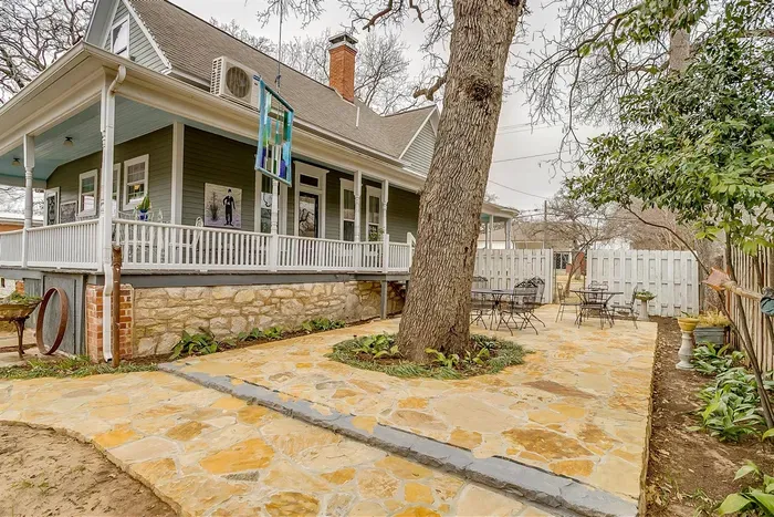 Newly constructed rock patio in the backyard, offering a beautiful outdoor space