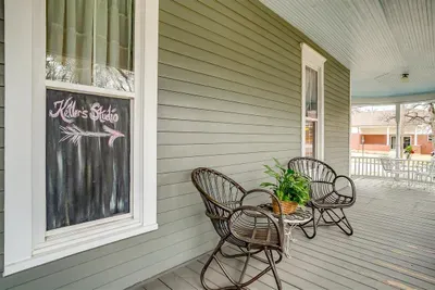 Back porch area, providing additional outdoor space for lounging or socializing