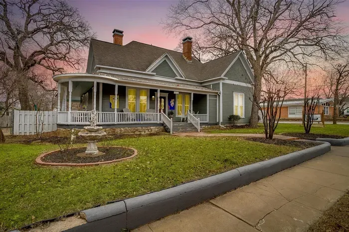 Charming exterior of The Gallery House, blending historic elegance with modern luxury