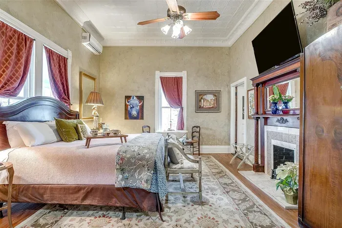 Spacious and stylish, this room features a smart TV, luxurious king bed, and unique architectural details