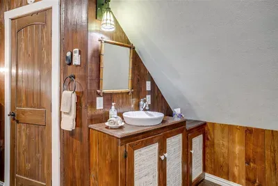 Vanity area in the room with a rustic design, providing a functional and stylish space