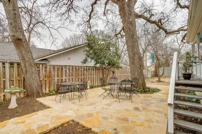 Newly constructed rock patio in the backyard, perfect for outdoor relaxation and gatherings