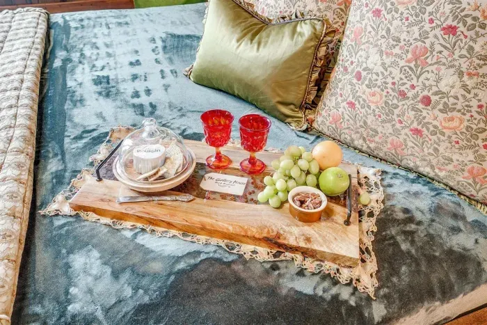 Indulge in a romantic setup with unique touches like vintage decor and cozy seating for intimate moments