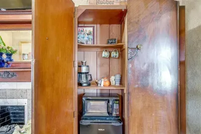 Enjoy a fully stocked coffee station and microwave for your convenience, located right in the room