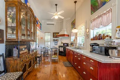 This cheerful and well-stocked kitchen provides all the essentials for preparing meals or snacks during your stay. With modern finishes and plenty of counter space, it’s a convenient and welcoming space for guests to use.