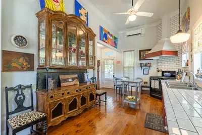 A beautifully designed kitchen in the common area offers guests a welcoming place to cook and socialize. With stainless steel appliances and plenty of storage, it’s an ideal space for preparing meals and sharing time together.