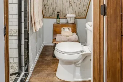 Private bathroom with a walk-in shower, modern design, and all the essentials