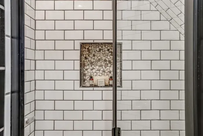 Modern walk-in shower in the private ensuite bathroom, providing comfort and convenience