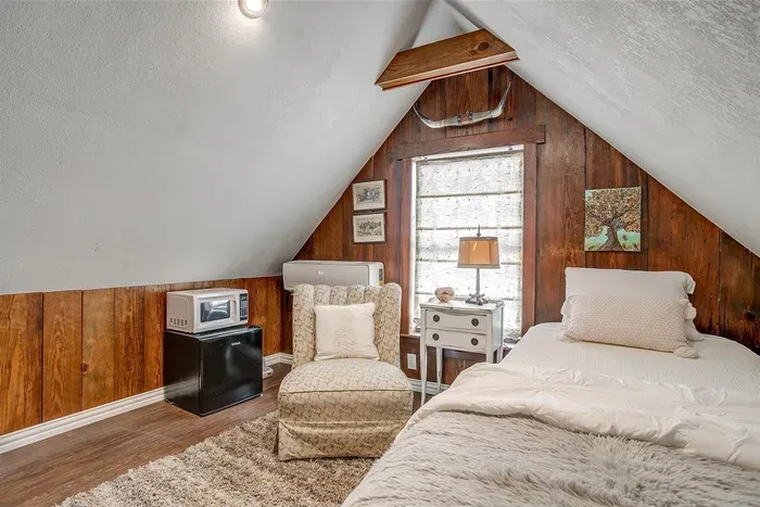 Convenient amenities like a mini fridge, microwave, and seating area make your stay more comfortable