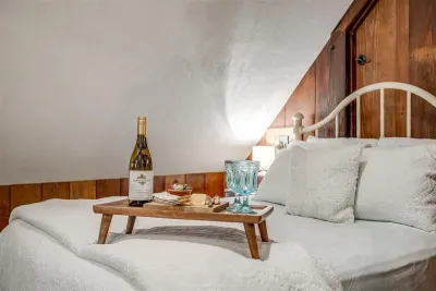 A cozy spot in The Attic with thoughtful touches, perfect for unwinding and enjoying a quiet evening