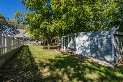 The serene backyard provides a quiet space to relax and enjoy the outdoors. With plenty of space for outdoor activities or simply lounging, it’s a wonderful spot to unwind after a day of exploration.