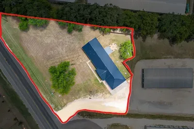 Fully fenced backyard and a two-car carport, with room for up to six vehicles and trailers.