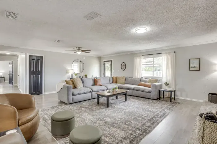 Open sightlines from the living room to the entry and the hall.