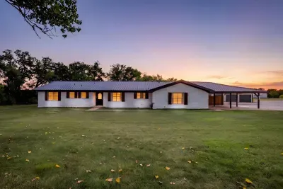Sunset over White House on 67, our newly remodeled 4-bedroom farmhouse just off Highway 67 in Stephenville.