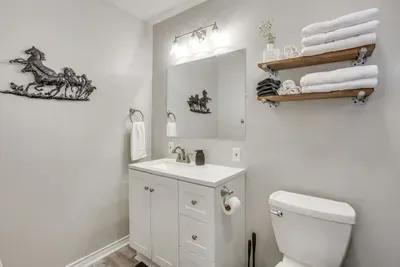 Private ensuite bath off the primary bedroom.