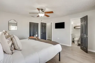 The primary has its own smart TV and a private ensuite bathroom.