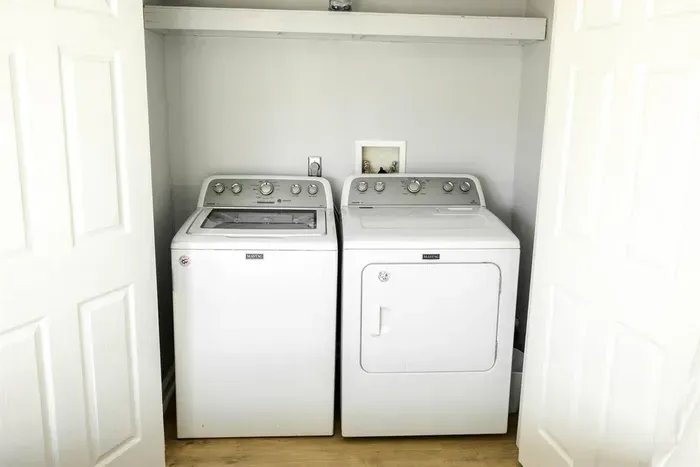 Enjoy the convenience of a full-size washer and dryer, perfect for extended stays or quick refreshes.