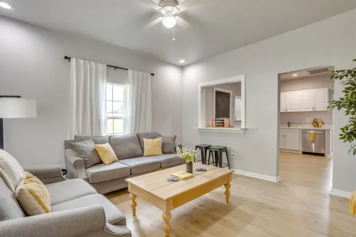 Open floor plan with living room flowing straight into the kitchen — great layout for groups who like to cook and hang out together.