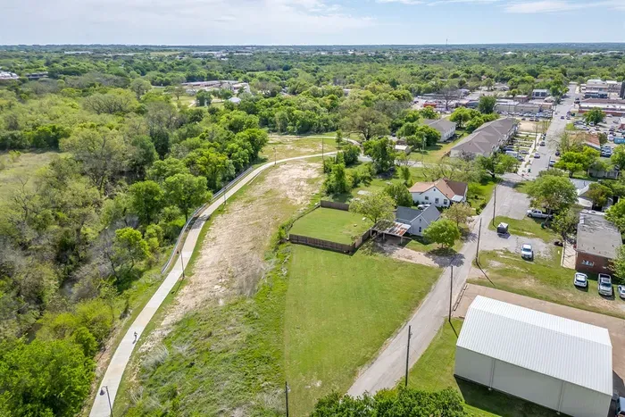 The Bosque River Trail runs right behind the property — step out the back gate and you're on one of Stephenville's best walking and biking trails.