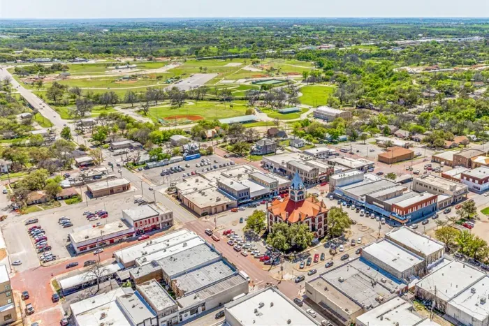 Another aerial view showing The Hive's prime Stephenville location — walk to downtown, drive minutes to Tarleton, and back up to the Bosque River Trail.