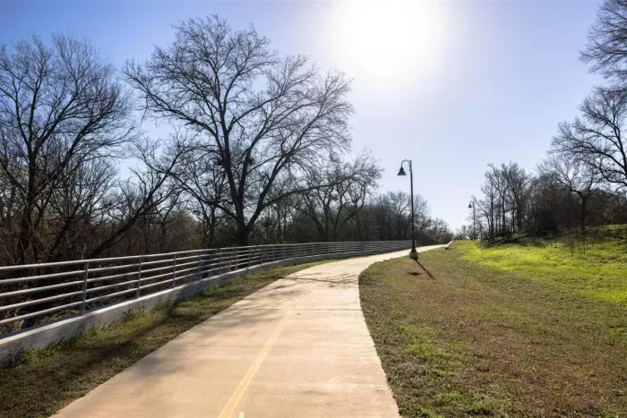 Enjoy direct access to the scenic Bosque River Trail from the backyard, perfect for nature walks or bike rides.