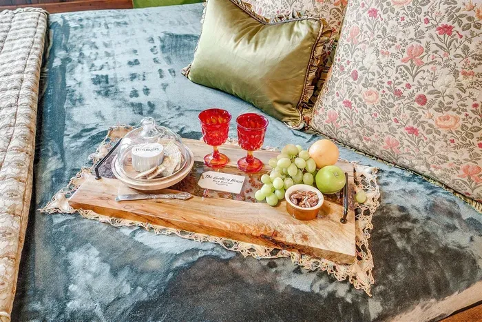 Indulge in a romantic setup with unique touches like vintage decor and cozy seating for intimate moments