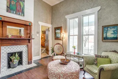 Bright and welcoming common area with plenty of seating and charming decor, perfect for relaxing or socializing