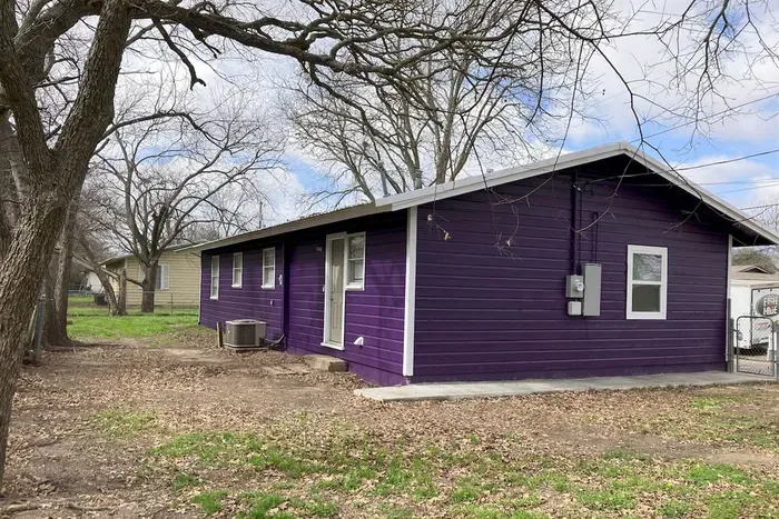 Backyard view of The Purple House, a private and serene outdoor space in the heart of Stephenville