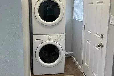 Convenient washer and dryer available in the home, complete with laundry essentials for your stay