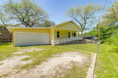 Driveway parking with room for multiple vehicles — convenient for families and boat trailers.
