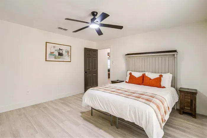 Another fresh and cozy sleeping space — all beds feature brand-new premium mattresses.