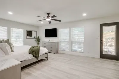 Wake up refreshed in this sunlit space with direct access to the backyard and tons of room to unpack.
