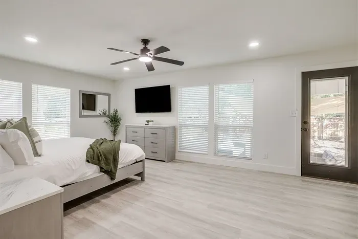 Wake up refreshed in this sunlit space with direct access to the backyard and tons of room to unpack.