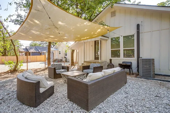 Unwind in your own private retreat with a modern outdoor seating area and plenty of space to gather, grill, or stargaze under the Texas sky.