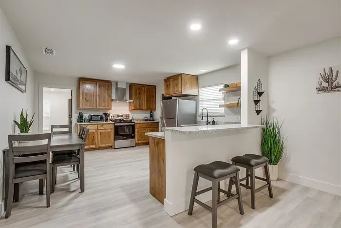 Cook with ease in this newly remodeled kitchen, stocked with everything you need, from pots to plates.