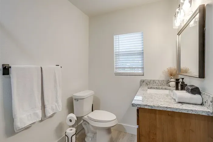 Fresh towels and ample counter space make this bathroom ideal for couples or longer stays.
