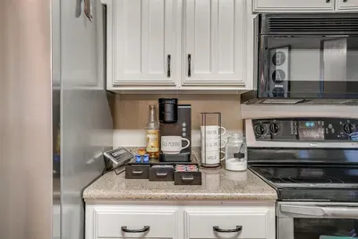 Dedicated coffee station with everything you need to kickstart your day, including a variety of coffee options and brewing essentials