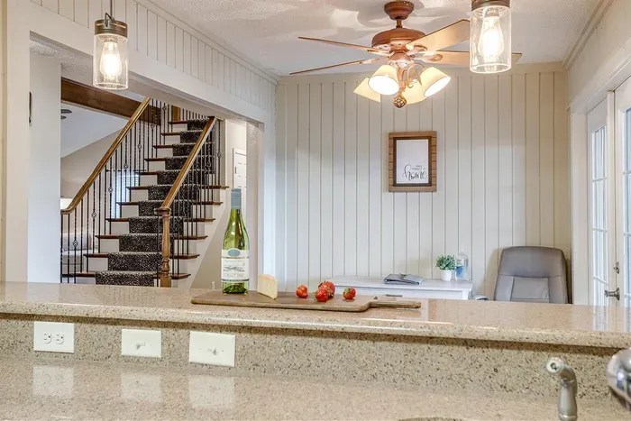 Chic bar seating area in the kitchen, perfect for casual dining, morning coffee, or enjoying a glass of wine while socializing