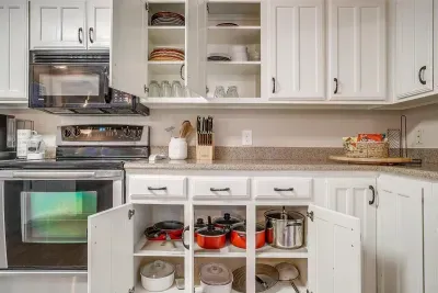This fully stocked kitchen includes everything you need for cooking, from pots and pans to utensils, ensuring a hassle-free meal preparation experience
