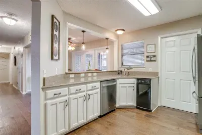 Convenient laundry area with a washer and dryer, perfect for extended stays or keeping your wardrobe fresh