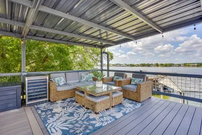 Kick back on the covered upper deck right over the water
