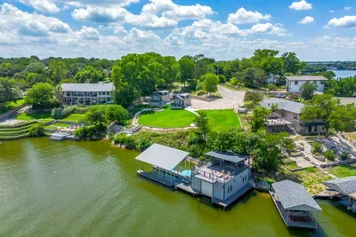 Aerial view of the lakefront lot and private two-tier dock