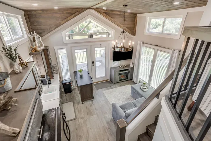 Loft-level view over the open living and dining space