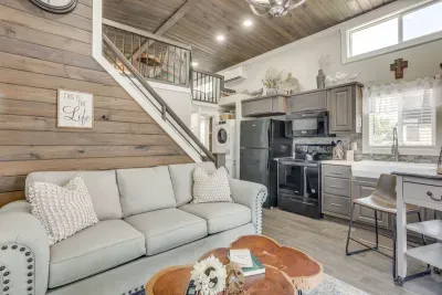 Cozy up on the sofa beneath the lofted bedroom